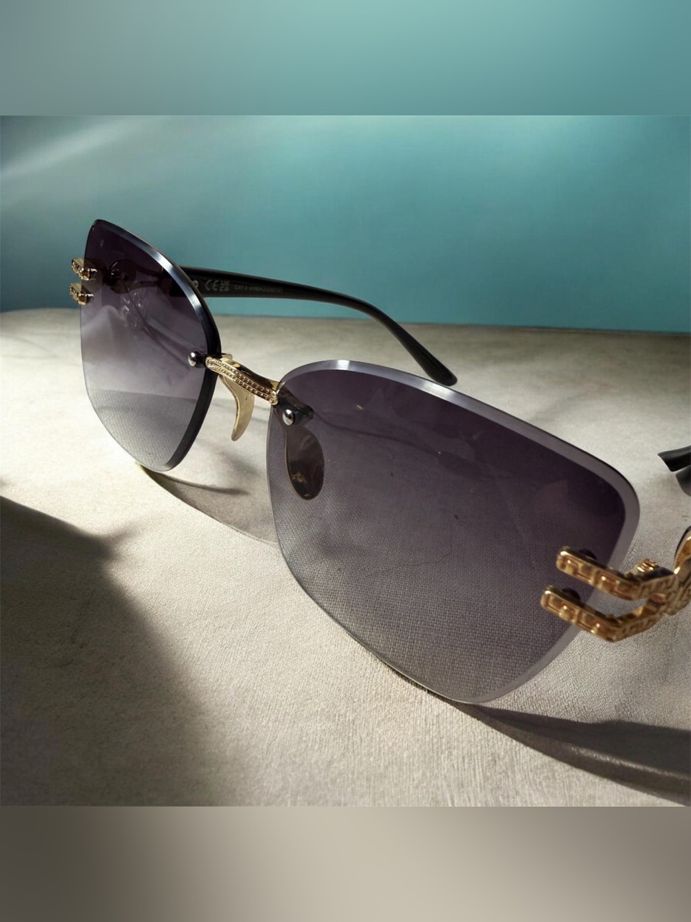 Rimless Black Gradient Women's Sunglasses with Gold Accents